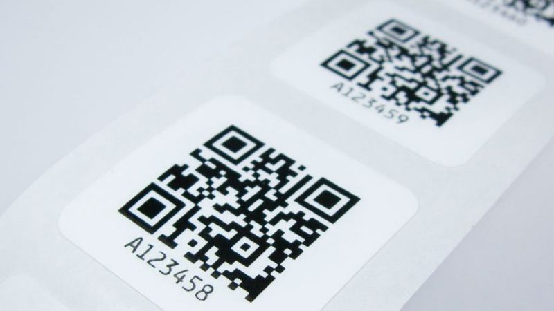 close image of 29mm square nfc tag with a qr code print