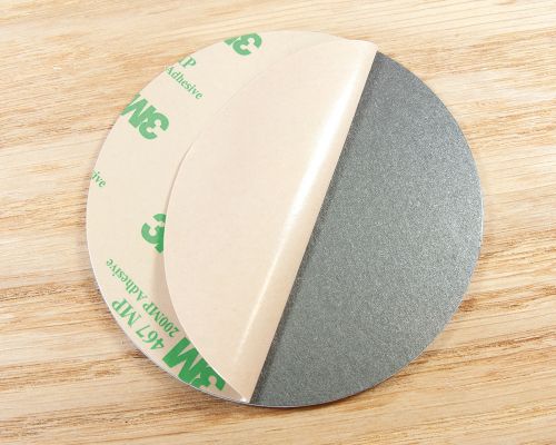 Close up image of an NFC PVC Plate Tag On Metal