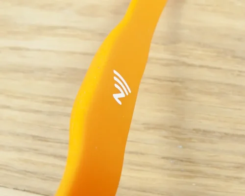 Detail of an NFC Smooth Slim Popclip NFC Wristband