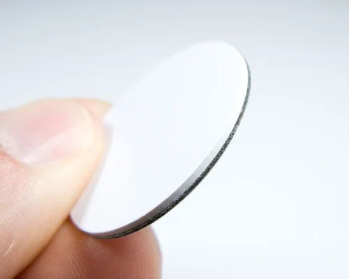 Close up image of an NFC 30mm On-Metal PVC Disc NTAG424