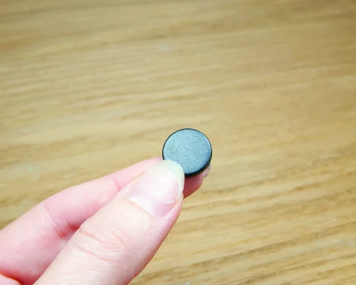 Close up image of an NFC 16mm PPS Disc Tag