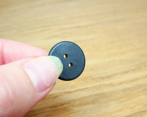 Close up image of an NFC 18mm PPS Disc Tag