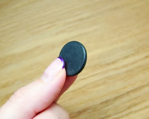 Close up image of an NFC 20mm PPS Disc Tag