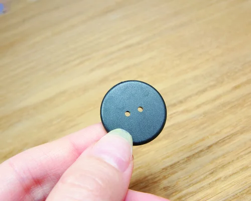 Close up image of an NFC 25mm PPS Disc Tag