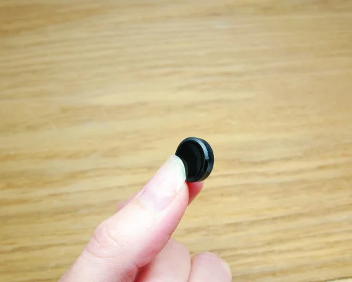 Close up image of an NFC 13mm On-Metal PPS Disc Tag