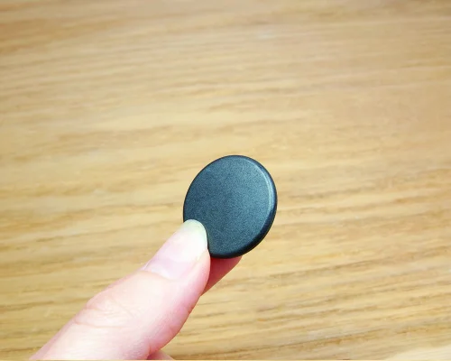 Close up image of an NFC 26mm PPS Disc Tag