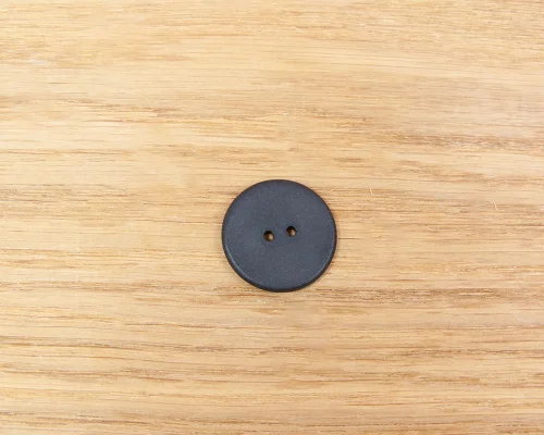 Detail of an NFC 25.5mm Button Laundry Tag NTAG213