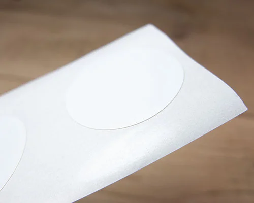 Close up image of an NFC 25mm White NTAG213